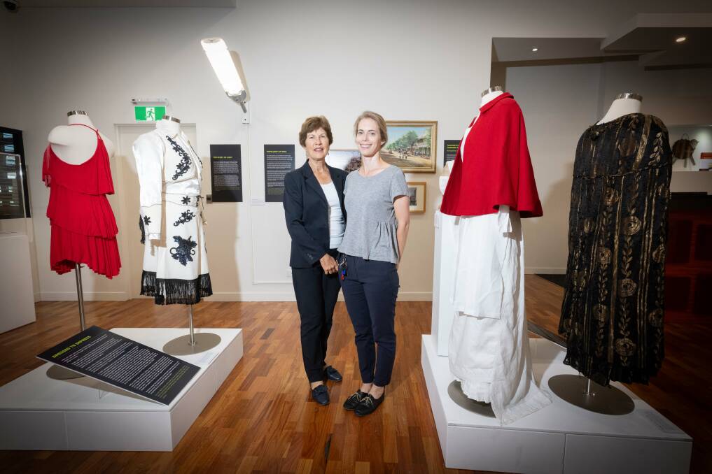 TRC councillor Helen Tickle and museum operations and visitor engagement officer Naomi Blakey stand amongst the navigating history exhibit at Tamworth Regional Gallery. Picture by Peter Hardin.