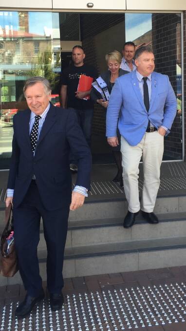 No conviction: Barrister Peter King, left, and Senator Rod Culleton, right, leave Armidale Local Court with supporters and a solicitor on Tuesday after pleading guilty to larceny. Photo: Breanna Chillingworth