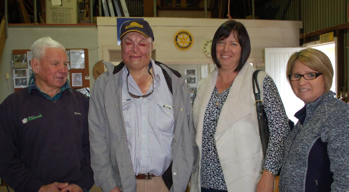 Walcha Men's Shed representative Peter Sendall with guest speaker Peter O'Keefe and his wife Suzanne , and Walcha Home and Community Care manager Cathy Noon