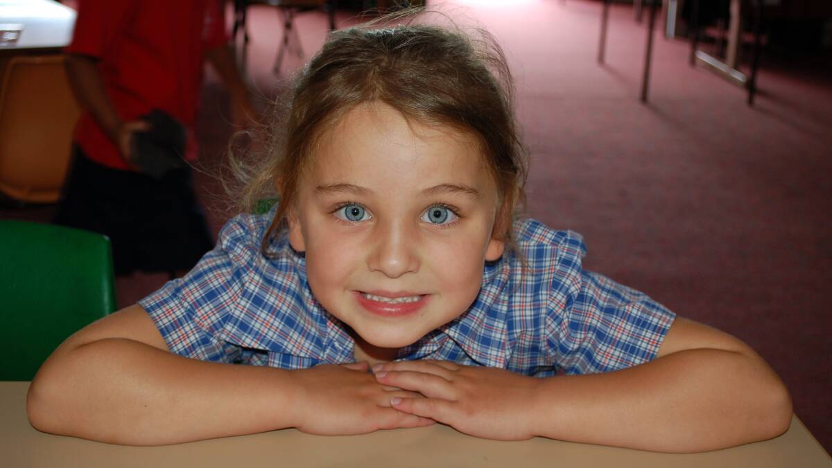 Jessica Wellings likes playing with her friends and doing craft at school.