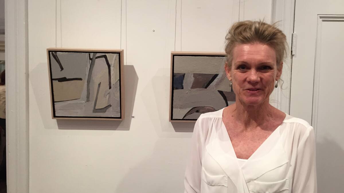 Abstracted: Northern Rivers artist Susan Jacobsen in front of some of her landscape work which was inspired by the Oxley Rivers National Park.