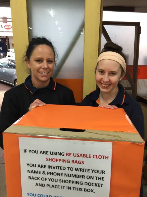 Plastic bag free: Cindy Furneaux and Abbey Levingston with the competition box in Foodworks on Tuesday.