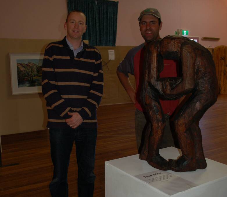 Walcha Anglican minister Ben France with Stuart Wellings at the Easter exhibition