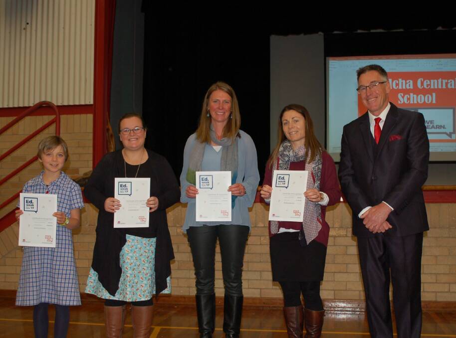 Outstanding work: Steph Blake, Rachel Wellings, Hannah Crawford and  Sonia Ussher receive their awards from WCS Principal Mark Hall