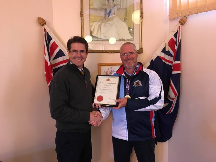 Mr Reeves received his award from Kevin Anderson in the Walcha Council Chambers last week.