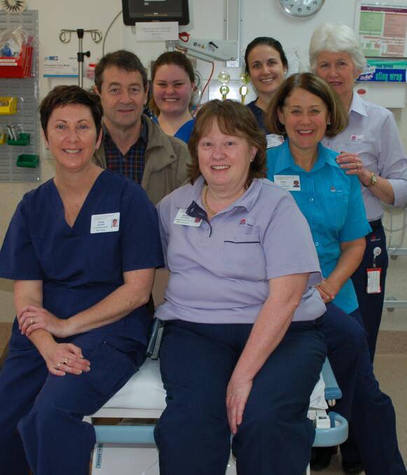 Part of the Walcha MPS dream team: Dr Adrian Allen with Fiona Wiggins, Stephanie Bell, Kate Lisle, Cathy Lisle, Kerry Hollis and Sandra Partridge. A new visiting medical officer will start work at the hospital in January.