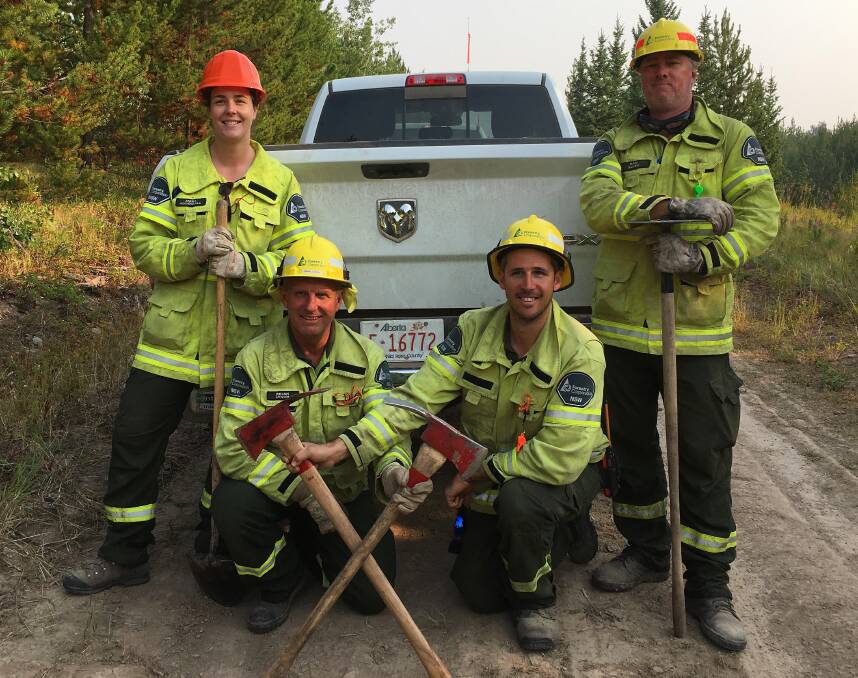 Not lumberjacks but they're OK: Forestry Corporation’s Amba Addinsall, Brian Lynch, Matt Hagon and Dan Allen on deployment in Canada.