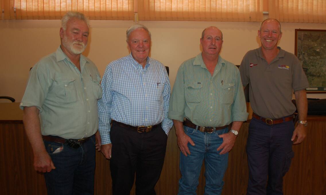 Graham Brazel, Don Noakes and David Worsley with the Commissioner in Walcha Council Chambers.
.