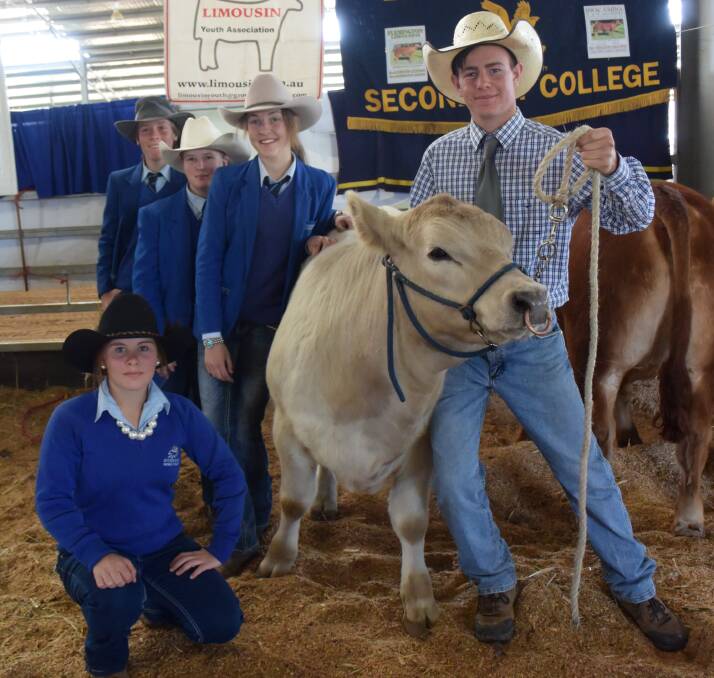 Walcha resident Cameron Hull (right) with students from O'Connor College (from left) Skye Danieli, Will Wood, Keshina Blackman and Bianca Daniel at the annual Beef Fest in Armidale.