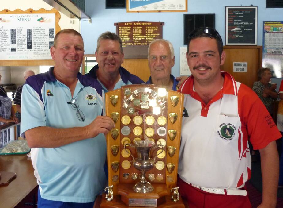 Smiling faces: Winners of the Pasture Wonderland Bowls Carnival Ian Bird, Steve Goodwin, John McLean and Adam Carr with the trophy.