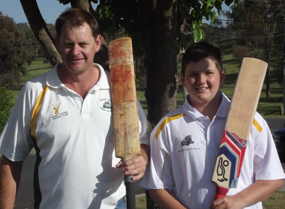 Top game: Walcha cricket players Peter Mooney and Daniel Boyd all smiles in the Walcha News Cup. Both players scored their maiden senior centuries last Saturday. 