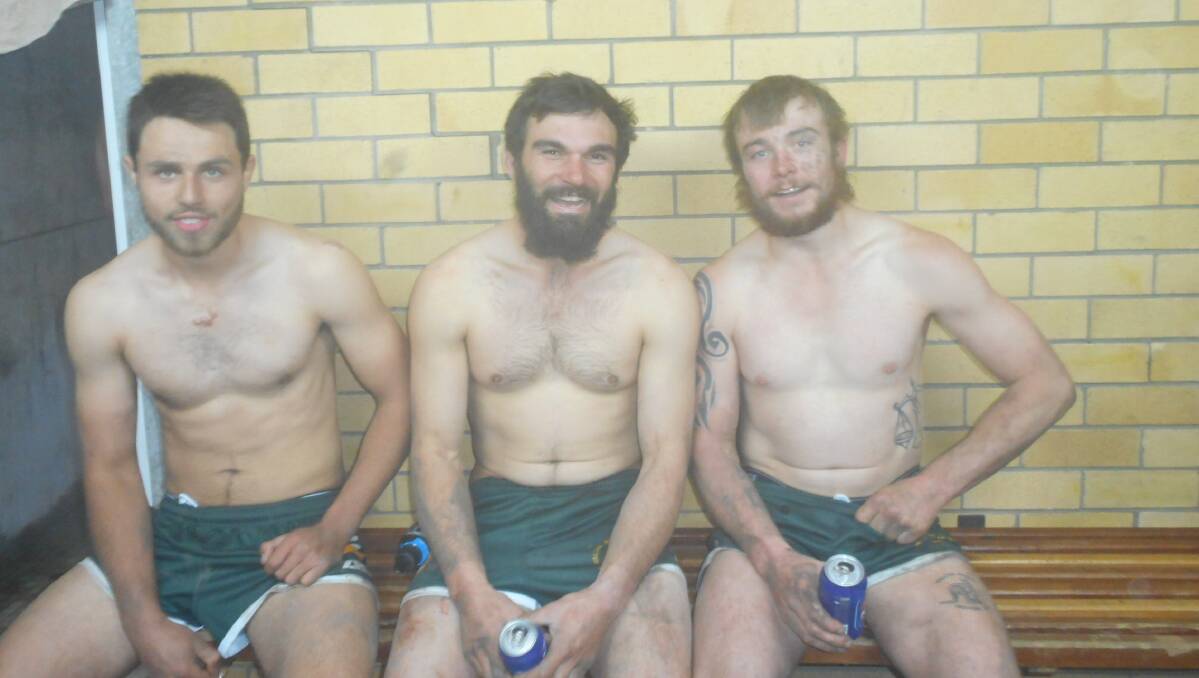 Downtime: Roos Harley Cox, Steve Eveleigh and Benny Green relax after their game last Saturday.