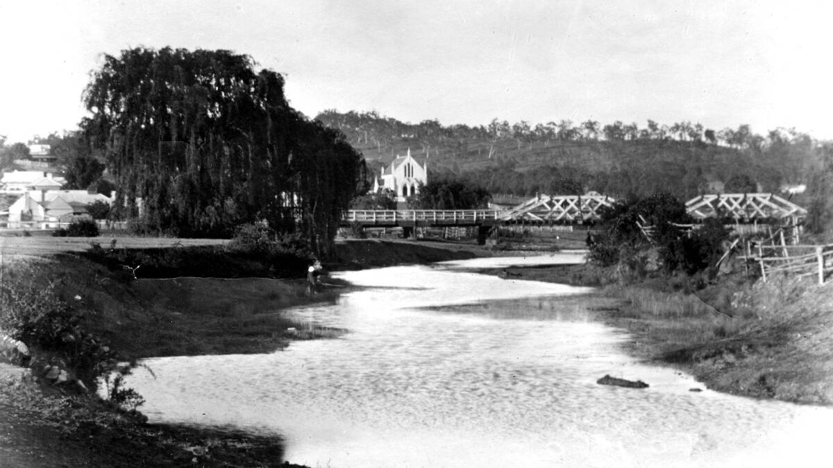 Historic crossing: The first of three road bridges built over the Apsley River in Fitzroy Street. The Presbyterian Church is in the background.