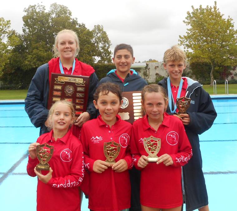 Special award winners: (back) Chloe Mackaway, Thomas Micallef and Zac Warden, (front) Poppy McLaren, Charlie Morgan and Bella Crawford were rewarded for their efforts in the pool for the Flippers.