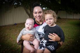 Tobi-Lee Clough, pictured here with her two little champions, Romi-Lee and Koa, is excited to be returning to the field for the Magpies this season. Picture by Peter Hardin