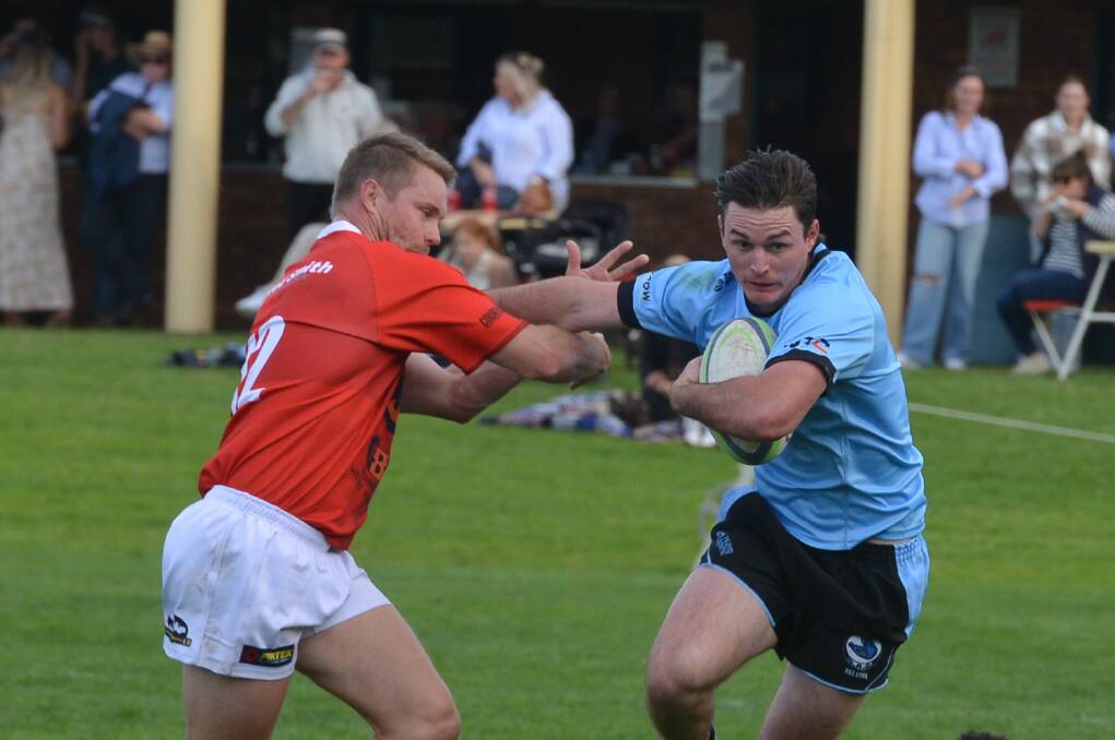Joe Baker gives Gunnedah centre Cameron Mitchell the brush off during one of several rampaging runs last Saturday. Picture by Samantha Newsam