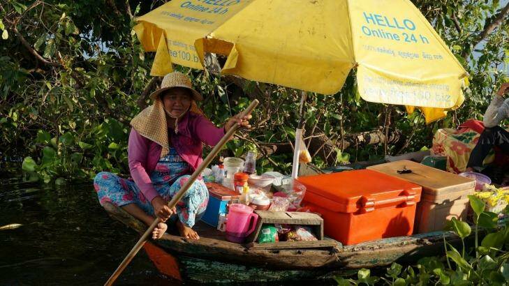 A floating shop passes on Cambodia's Great Lake. Photo:  Steve Meacham