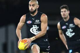 A hamstring injury means Carlton will miss Adam Saad's rebound out of defence. (Joel Carrett/AAP PHOTOS)