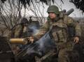 Ukrainian troops are on the back foot on the battlefield and face shortages of artillery supplies. (AP PHOTO)