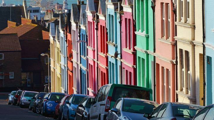 Early morning casts shadows and illuminates colourful houses in Brighton. Photo: iStock