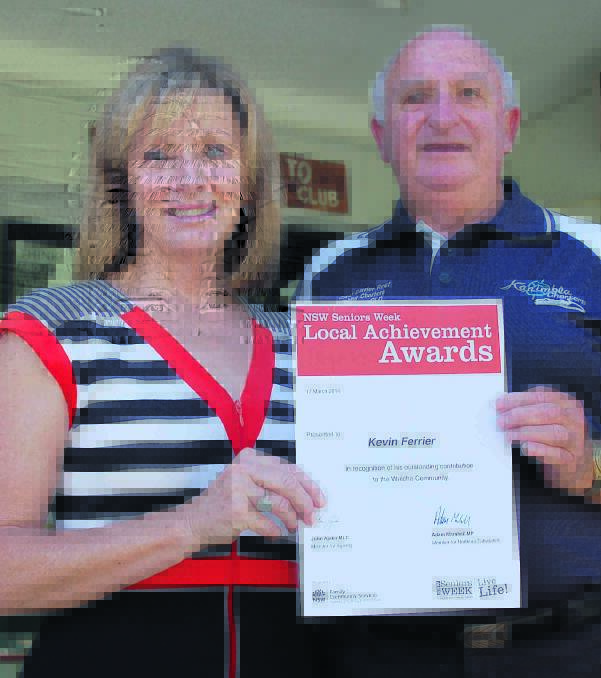 Former deputy mayor Kevin Ferrier received his NSW Seniors Week achievement award from mayor Janelle Archdale.
