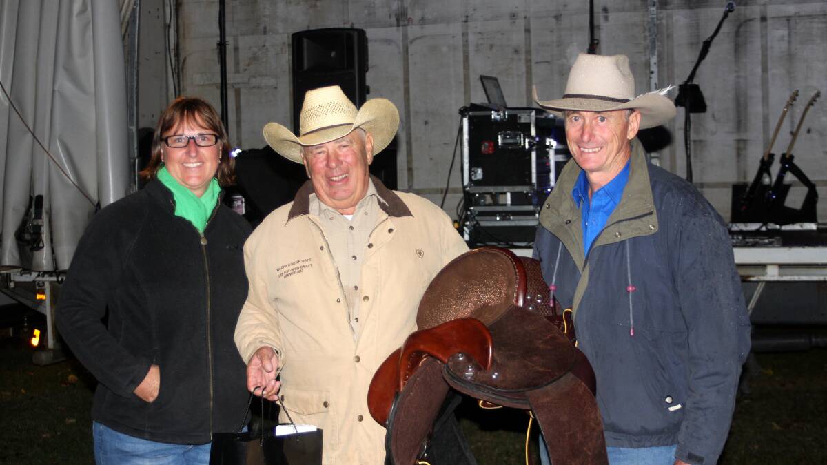 Sno Elks Memorial Maiden Campdraft Winner – Jim Lyons (horse Dear Dulcie) being presented with the Brady Sports Saddle by Bernie Brady and Kerrie Smith looking on.