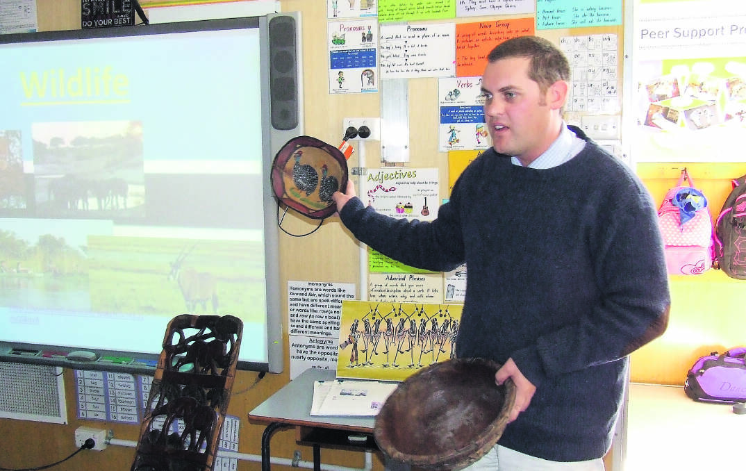 Guest speaker Kevin Squires shows some artifacts from Botswana.