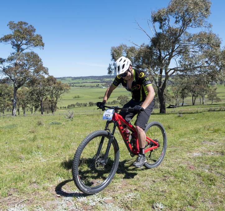 CHALLENGE: Carl Hooton tackles the Walcha teams challenge course as part of the Mountain Festival. Photo: Peter Hardin. 