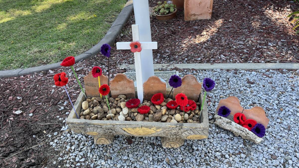 A prototype of the crochet bouquet set to adorn the Easy Living Retirement Villas flagpole on Anzac Day. Picture by Jonathan Hawes