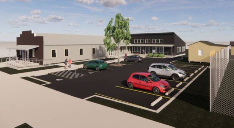 The original hall (left) will be maintained and preserved, while a new library and community area is being built at the back as an extension. Picture supplied by Tamworth Regional Council