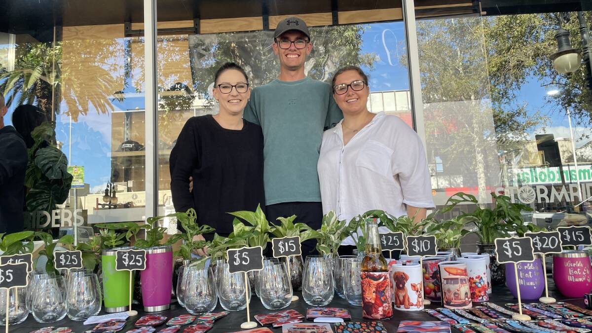 Alicia Griffiths, Carter Griffiths, and Dakota Mellross sell their handmade goods from Alice Designs. Picture by Jonathan Hawes