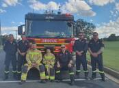 Golden Guitar winner and firefighter Travis Collins with charity ride along recipient Ryan Brockway and South Tamworth firefighters. Picture supplied