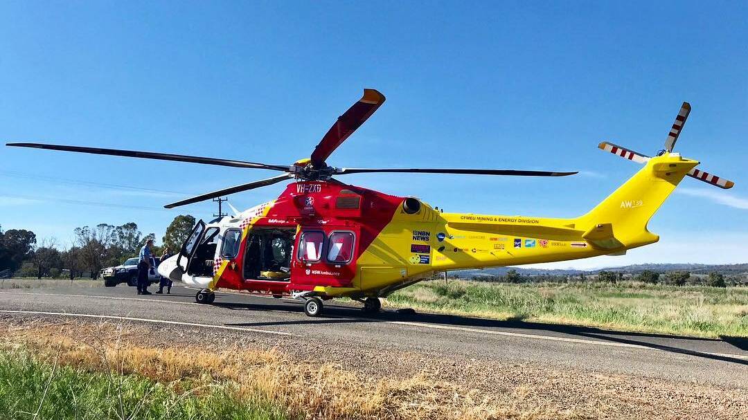 Emergency: The Westpac Rescue Helicopter on the scene of the crash near Quirindi on Thursday morning. Photo: Westpac Rescue Helicopter