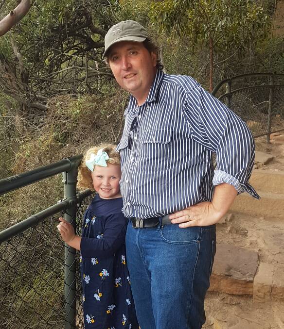 Tim Joyce with his daughter Gracie in the Blue Mountains last year. One of his favourite pastimes was bushwalking. 