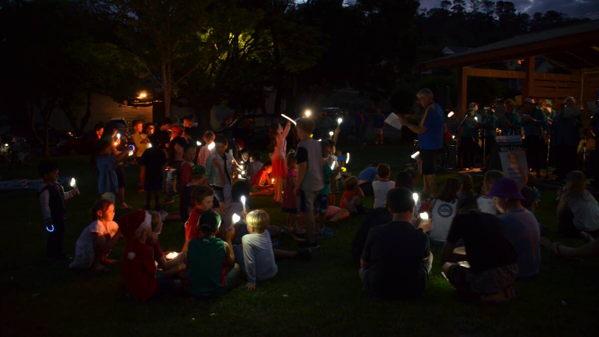 Carols by candlelight in McHattan Park