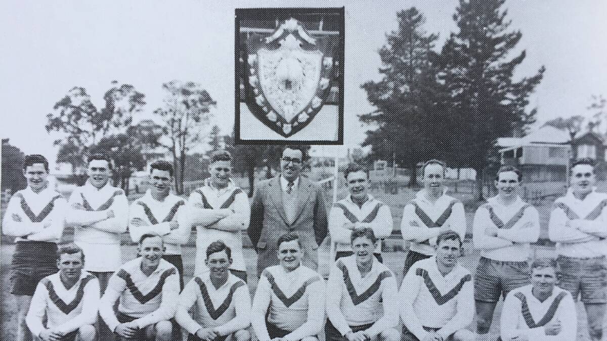 1953 New England first Grade Major Premiers with their coach Keith Cummins (centre back row) and captain Peter Fenwicke (centre front row)