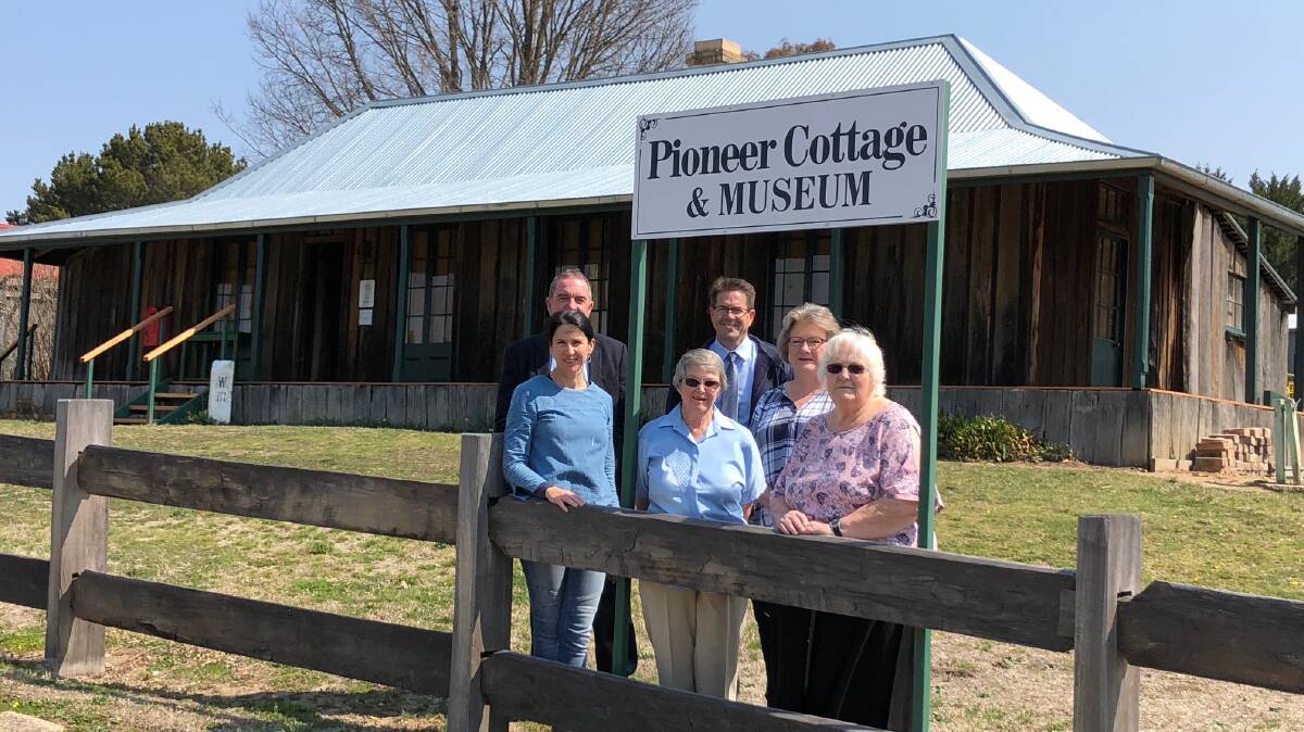 MP Kevin Anderson with Walcha Council tourism manager Susie Crawford, mayor Eric Noakes and Walcha Historical Society members Katey Hoy, Jane Morrison and Kerry Kickson. As well as the Heritage Near Me project money, Mr Anderson also announced a further $19,910 in grant money for the Walcha & District Historical Society to replace the Pioneer Cottage Museum verandah floor and carry out some important repairs.