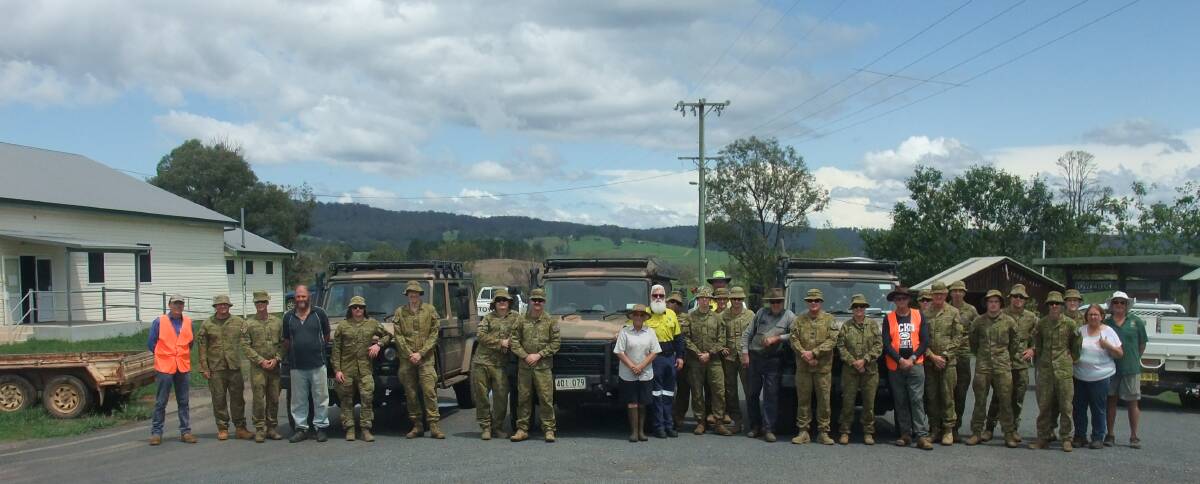 MISSION POSSIBLE: Members of the Australian Defence Force at the BlazeAid Camp in Yarrowitch on Sunday.