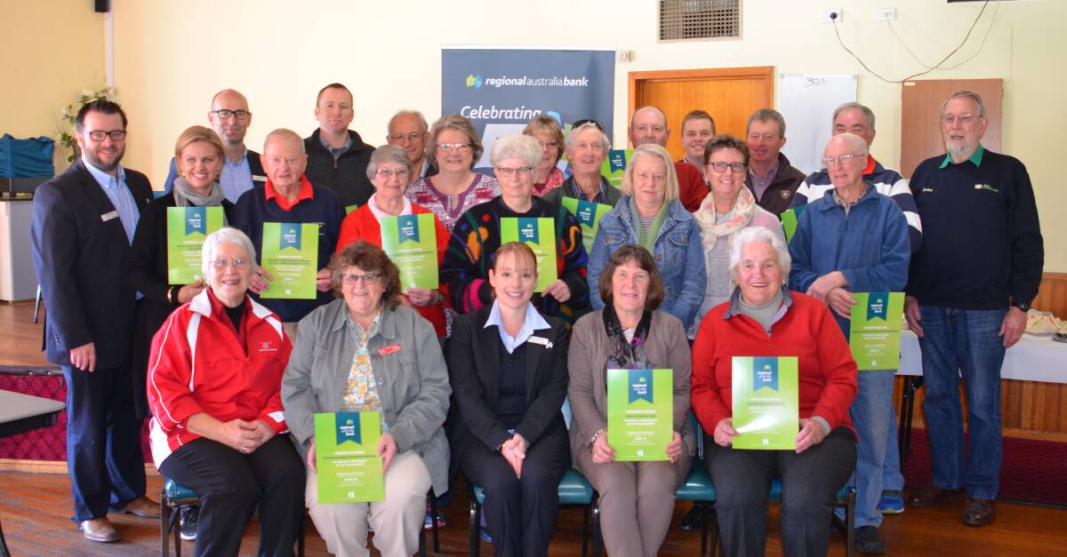 ALL SMILES: The delighted representatives from the community groups who received a slice of this year's Regional Bank of Australia Walcha community donation of $18,525  with Walcha membership officer Sara Pittman (centre)