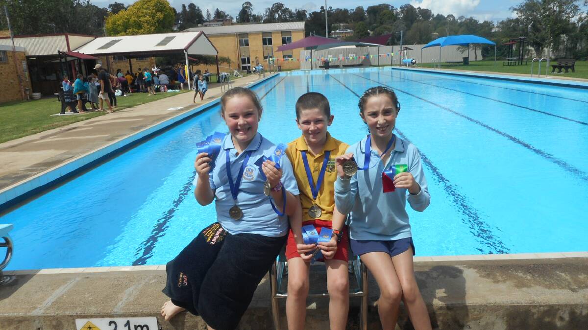 SWIMMERS ARE GRINNERS Charlotte Gibson, Daniel Bridge and Tilly Casburn