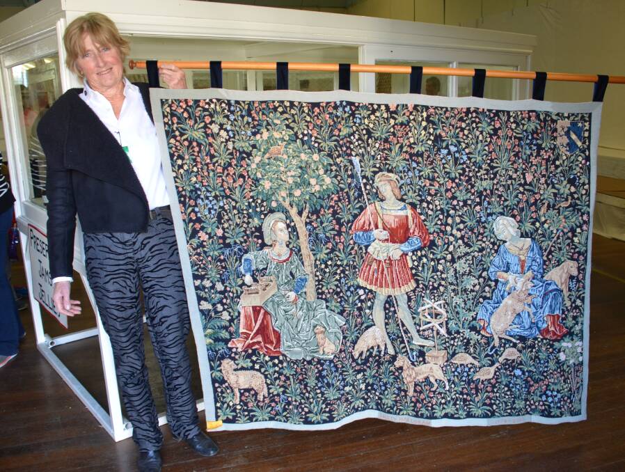 A WOMAN OF MANY TALENTS: Wisty Halloran at the 2018 Walcha Show with her magnificent medieval tapestry which took forty years to finish.
