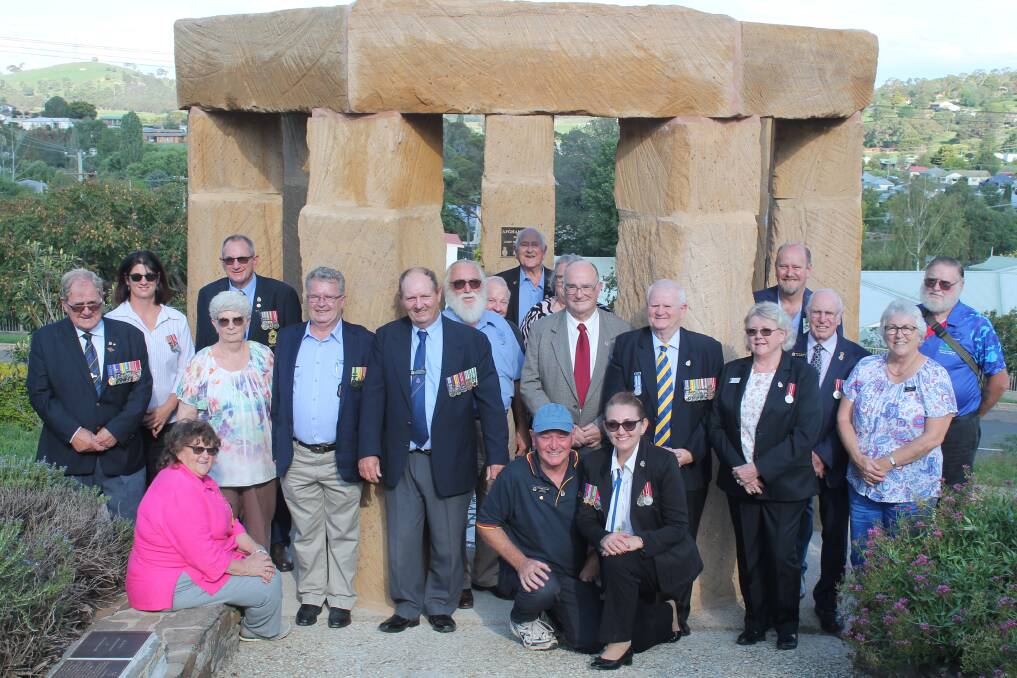 FACING A FRESH FUTURE: Members of the New England District Council of RSL sub-branches with NSW RSL acting president Ray James, NSW RSL Auxiliary coordinator Pauline James and NSW RSL board director Sandra Lambkin at the Walcha War Memorial last Saturday. Photo supplied.