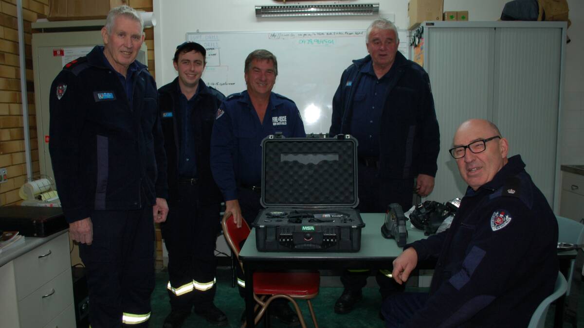 Team training: Hamish Hoare, Captain Peter Dunn, Paul Brown and Vice Captain Darrell Parsons with Duty Commander Wayne Zikan with the new thermal imaging camera in the Walcha Fire Station last week.