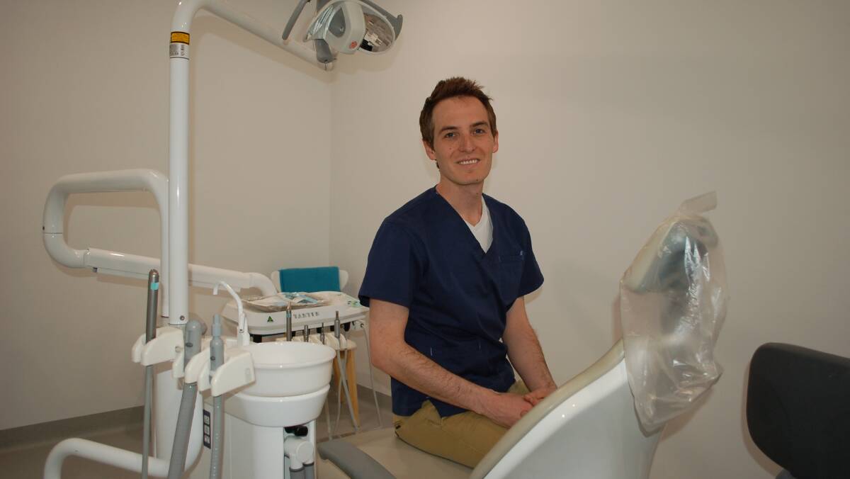 Lie back and relax: Dr Scott Williams in the newly renovated Walcha dental surgery. The practice is now open for business on Wednesdays and Thursdays. 