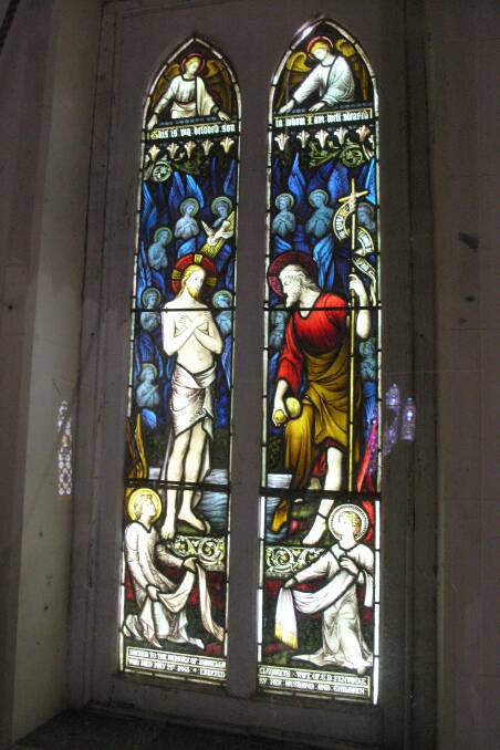 A section of the western window depicting the baptism of Christ. In the inscription along the bottom the surname of 'Fenwick' now has adopted an 'e' on the end.