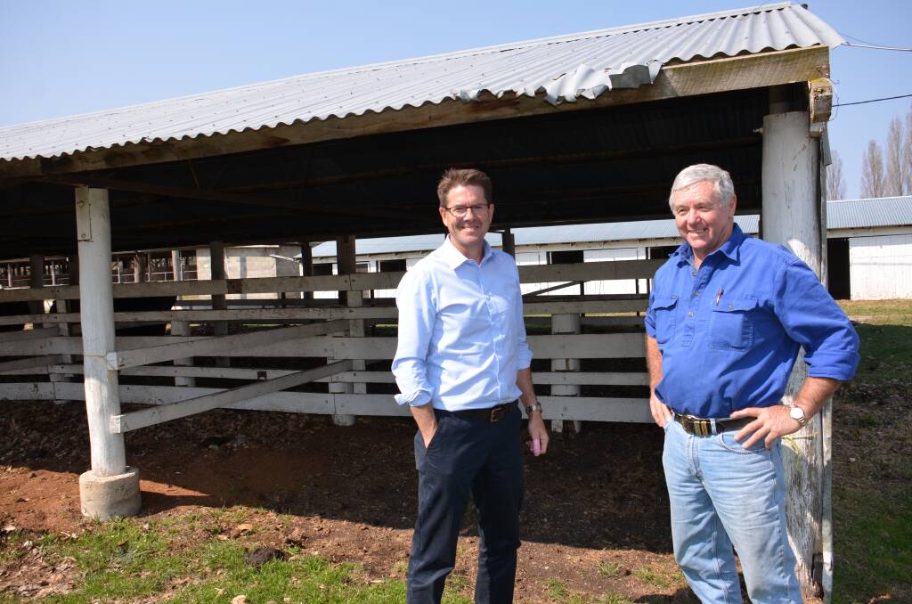 MP Kevin Anderson with Tim Norton at the old cattle shelters in the Walcha Showground