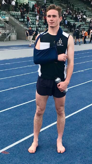 SMASHED IT!: Walcha allrounder  Nicholas Makeham at Homebush Stadium after beating his personal best, dislocating his shoulder and winning gold in the GPS championships. Walcha's Joe Kermode came fifth in the 15 yrs 400m.
