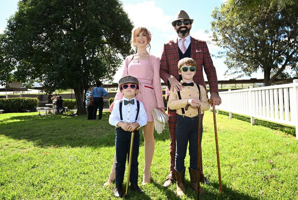Paul and Tahlia Holmes dressed to impress. As did Ollie, left, and Maxwell. Picture by Gareth Gardner