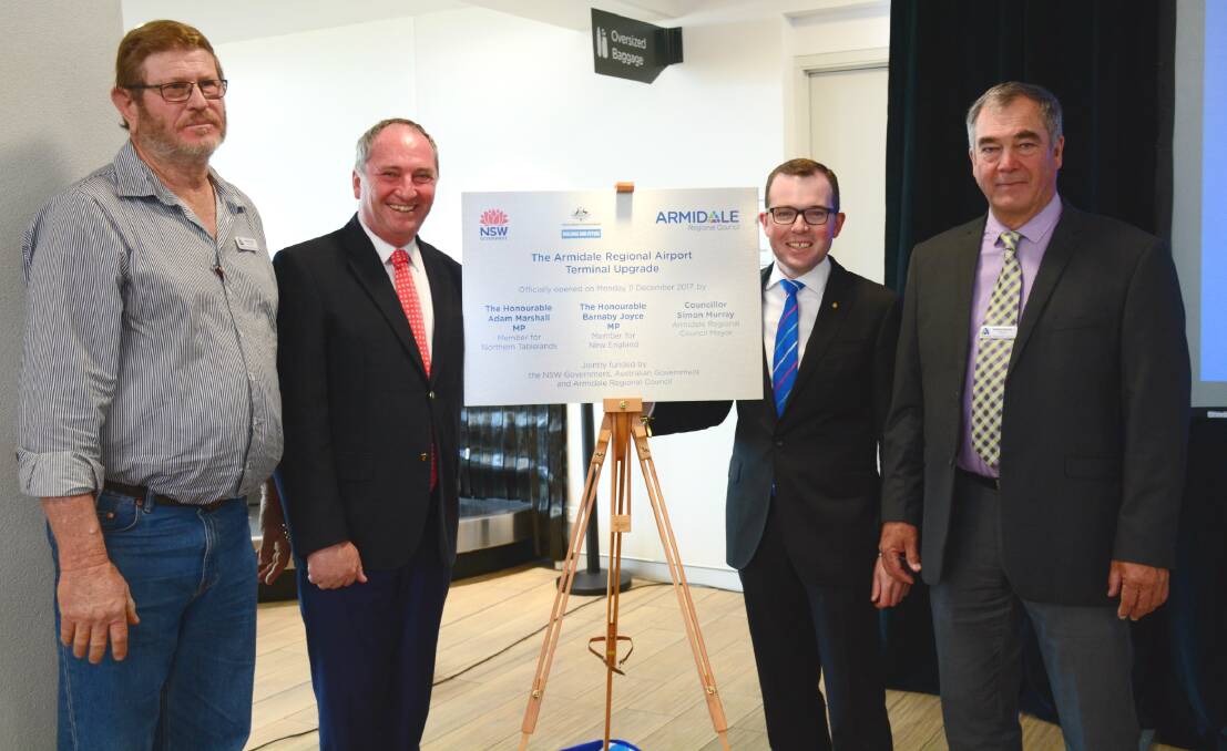 TAKE-OFF: Armidale Regional Councillor and Chairman of the Airport Users Group Andrew Murat, Federal Member for New England Barnaby Joyce, Northern Tablelands MP Adam Marshall and Mayor Simon Murray officially opened the $10.5 million airport expansion on Monday.