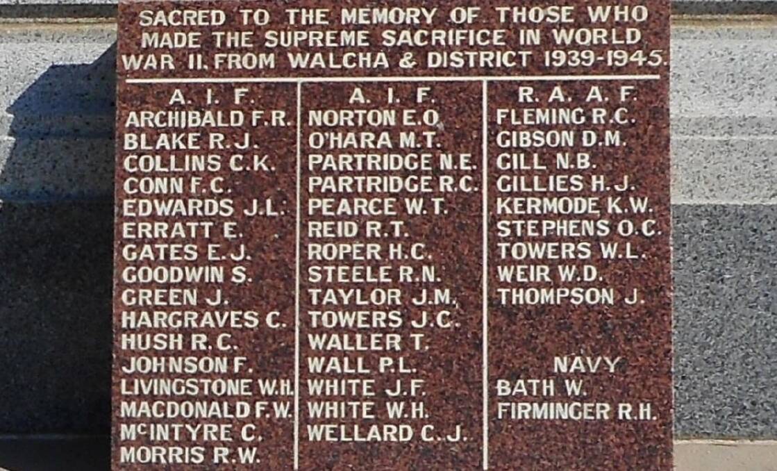 Slice of history: The panel added to the monument in the Walcha War Memorial Park after the end of World War II.